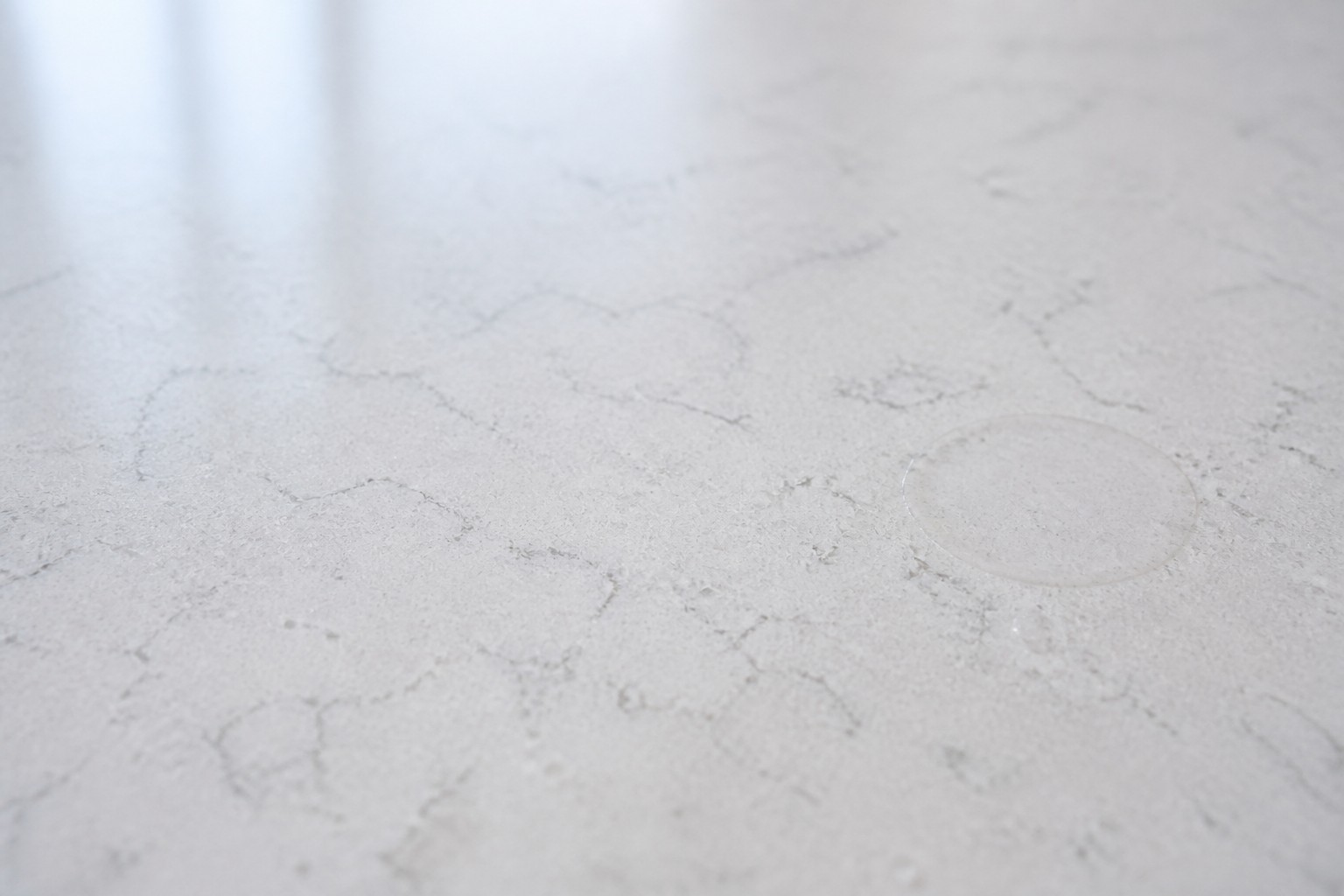A written Sub-Zero repair quote reviewed on a Walnut Creek kitchen counter